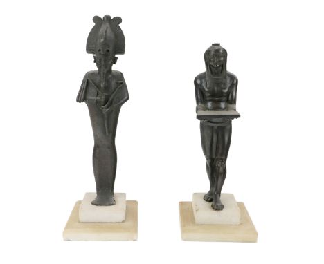 An Egyptian bronze Figure of Osiris, 26th Dynasty, 664-525 B.C., of slender form, his hands emerging in from his cloak and ho
