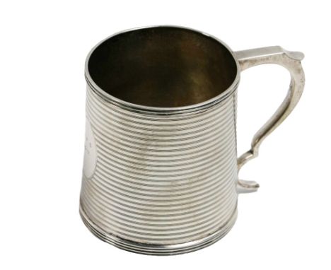 A silver Christening Cup, Birmingham c. 1917, by Mappin &amp; Webb, the cylindrical body with thread borders and horizontal e