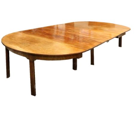 A 19th Century mahogany D end Economy Dining Table, with gate leg action with extra leaves on chamfered legs, approx. 320cms 