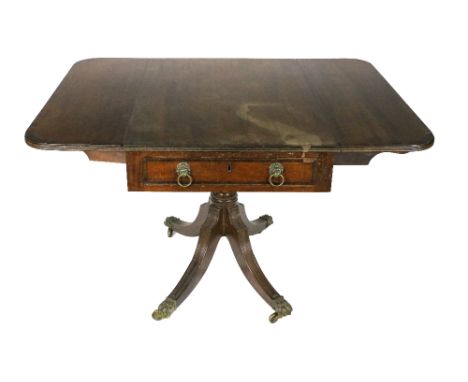 A 19th Century mahgoany drop leaf Table, the top with rosewood crossbanding and demi-lune flaps above a frieze drawer with li