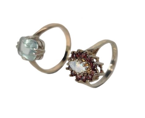 A Ladies silver gilt Ring Set, with central oval opal stone, surrounded by a ruby coloured garnet cluster, size M 1/2; togeth