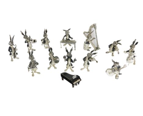 A 20th Century German Sterling silver "Hare" Orchestra, comprising conductors, harpist, guitar player, xylophone player and o