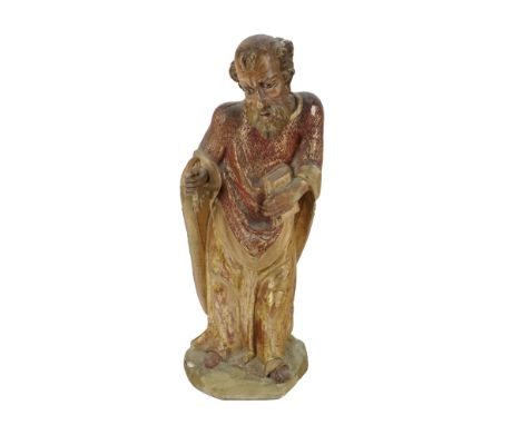 An early polychrome decorated "Figure of St. Peter," with gilded body and rust coloured cloak, with some plaster repairs, app
