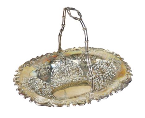 A fine quality 19th Century Chinese silver Basket, the hinged handle of bamboo design, the edge with scroll decoration, the o