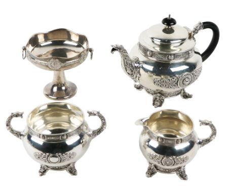 An attractive four piece Celtic Revival design Tea Service, comprising teapot, two handled sugar bowl, cream jug, and associa