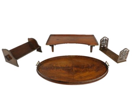 A mahogany oval shaped ebony strung and crossbanded Tray, with brass carrying handles; together with a wooden Bed Tray, a pie