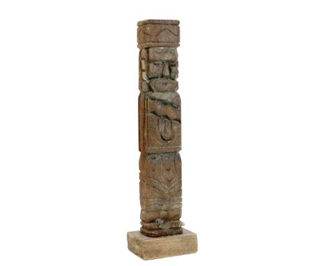 A 19th Century carved wooden Native American Candlestick, moulded as a totem pole. (1)