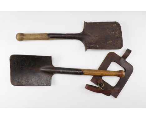 An Imperial German entrenching tool by Vogel &amp; Noot, one other similar tool and a carrier