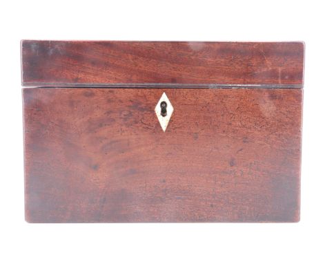 A mahogany tea caddy, having a vacant interior and bone keyhole escutcheon, 22.5 x 14.5 x 15 cm
