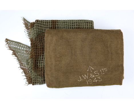 A 1943 British army Cap, Comforter, together with a camouflaged face veil