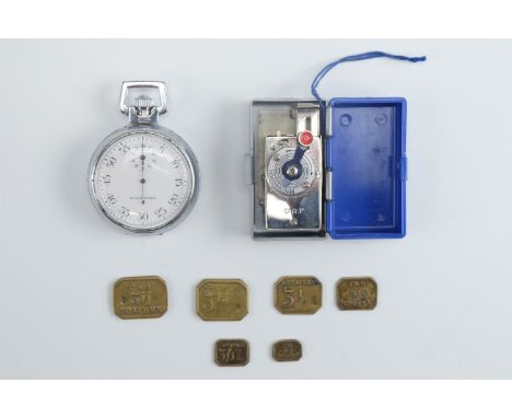 A small group of collectors' items comprising a vintage German Haka-Autoknips camera mechanical self-timer, an Elgin "Elgin T