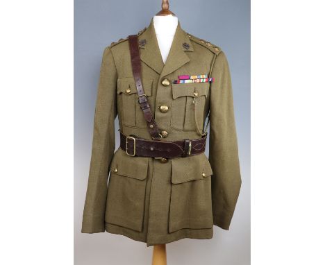 A 1940s Army Service Corps Captain's Service Dress tunic and Sam Browne belt