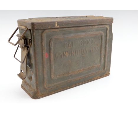 A US army Calibre .30 M1 ammunition box together with Garand rifle ammunition clips