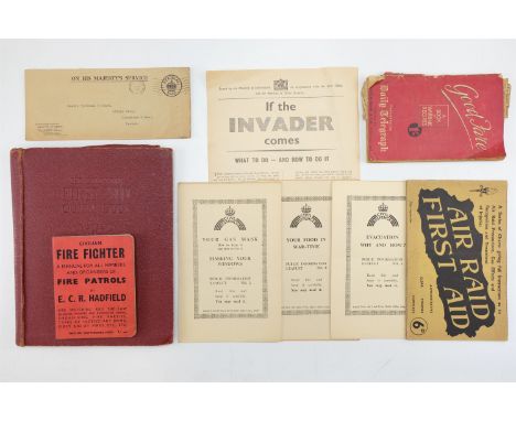 A collection of Second World War British Home Front publications including "The Complete First Aid Outfit Book and ARP"