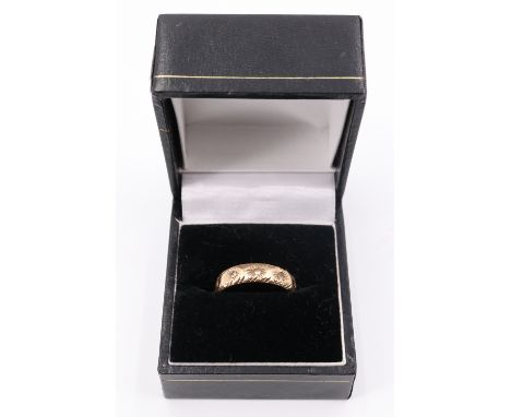 A 9 ct gold eternity ring set with white stones, Birmingham, 1975, (fineness mark overlapping a setting)  3.4 g, size N