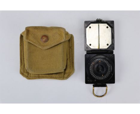 A Second World War British military Mark I Magnetic Marching Compass and Pattern 1937 compass pouch