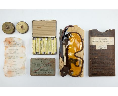 Second World War British army anti-gas ointment sets, eyeshields and anti-dim compounds