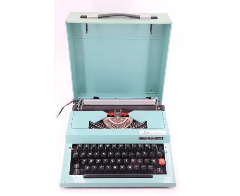 A Marista 30 portable typewriter and instruction manual