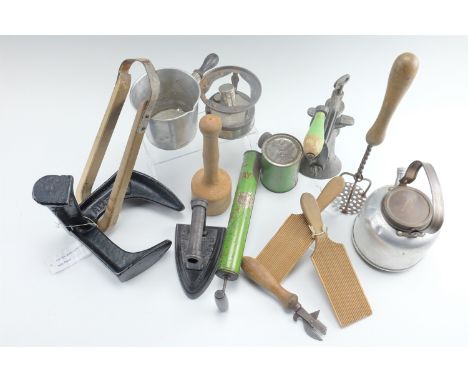 A collection of vintage domestic bygones including a cobbler's last, a sad iron, Sirram kettle and camping stove,  butter pat