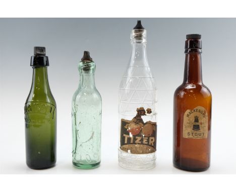 Four vintage glass drinks bottles comprising "Tizer", "J.M. Todd", "Machesons" and "W Lindsay", 2nd quarter 20th Century, tal
