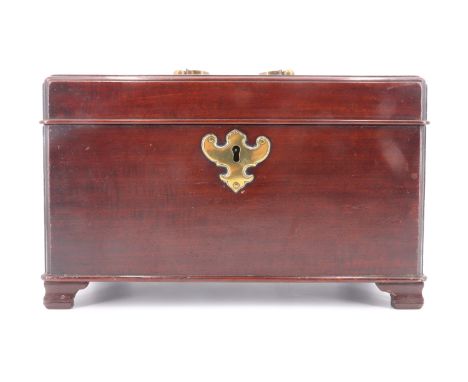 An unusual Georgian mahogany tea caddy, the interior fitted with three compartments in front of a vertical drawer, flanked by