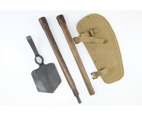 A 1940 dated British army spade type entrenching tool with reproduction webbing carrier, a sirhind type tool with 1937 Patter