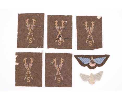 Second World War British army sniper qualification badges together with two operational parachutists' wings