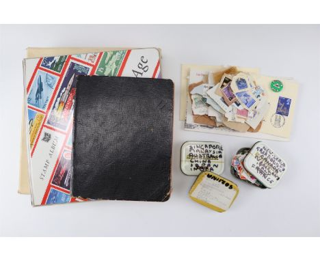 An album containing a small quantity of GB and world stamps, together with another containing a small quantity of world stamp