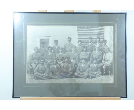 A large early 20th Century group photograph of Indian Army cavalry officers, 33 cm x 49 cm sight size, together with two othe