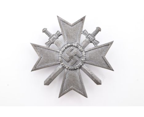 A German Third Reich War Merit Cross, with swords, first class, pin stamped 4, (a/f)