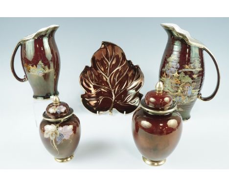 Two Carlton Ware Rouge Royale lidded jars, tallest 18 cm together with a leaf dish and two Crown Devon jugs, tallest 28 cm 