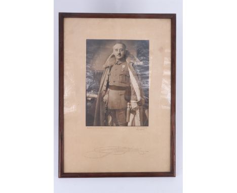 A portrait photograph of General Francisco Franco, Spanish dictator, autosigned, by Jalón Ángel, in moulded frame under glass