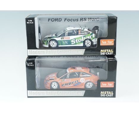 Two die-cast Modern Rally Collectables, Ford Focus WRC cars, 1:18 Scale