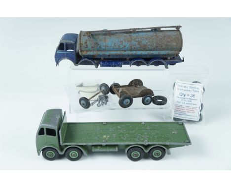 A Dinky "Foden" flat bed lorry, together with another lacking wheels, (a/f)