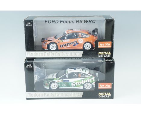 Two die-cast Modern Rally Collectables, Ford Focus WRC cars, 1:18 Scale