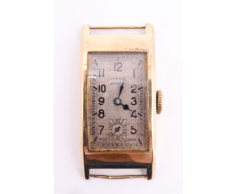 A 1920s West End Watch Co "Secundus" 9 K yellow metal wristwatch, having a rectangular frosted silver face with poker hands, 