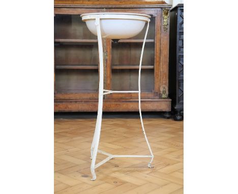 A late 19th / early 20th Century hospital enamelled hand wash basin and iron stand, 36 cm x 79 cm