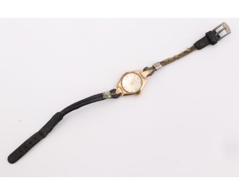A 1960s Eterna 9 ct gold wristlet watch, in a lozenge shaped case, on a leather strap, Birmingham, 1963, 10.46 g, 17.5 mm wid
