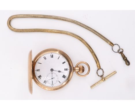 An early 20th Century Elgin rolled gold hunter pocket watch, having a crown wind and set movement in an engine turned case, a