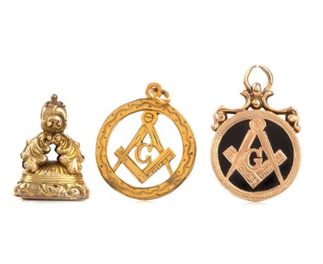 NINE CARAT GOLD MASONIC PENDANT,with central compass device, 35mm including bale, along with another, two Grand Lodge of Scot