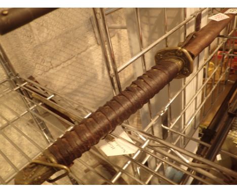 Good qualtity Japanese sword with leather bound hilt and scabbard, blade L: 68 cm  CONDITION REPORT: No visible damage or res