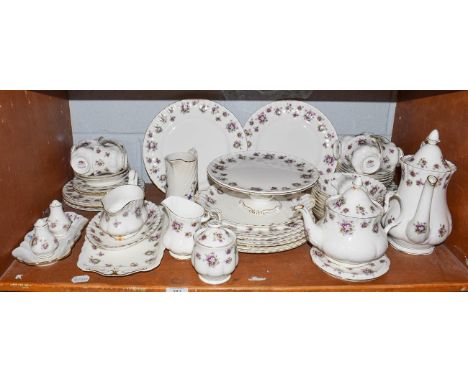 A Royal Albert Sweet Violets pattern part tea and dinner service including coffee pot, teapot, dinner plates and comport etc 