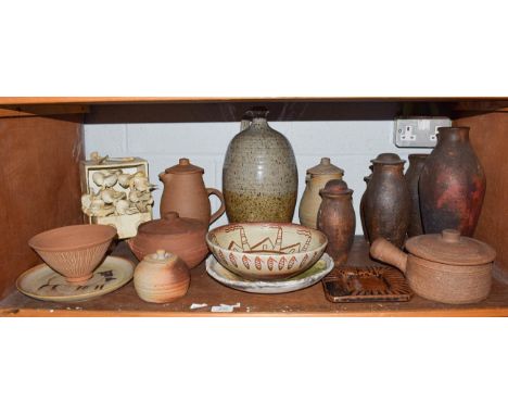 A shelf of studio pottery including Leach standard wares, five Raku glazed jars (three lidded) signed, Paolo Spannato etc