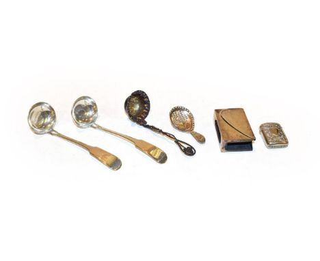 A collection of silver, including: a pair of toddy ladles, Edinburgh 1825; a caddy-spoon, repaired; a matchbox-cover; a Victo
