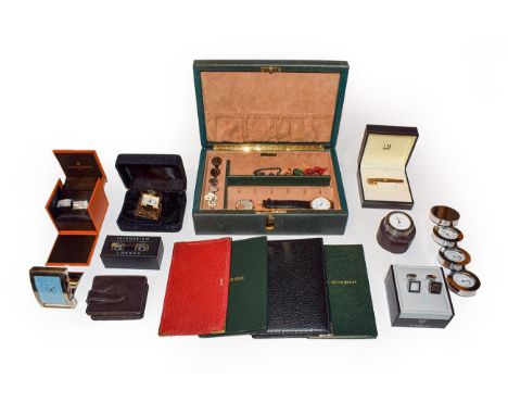 Four Smythson items including a sterling-mounted jotter, two Links alarm clocks in leather cases, two other timepieces, three