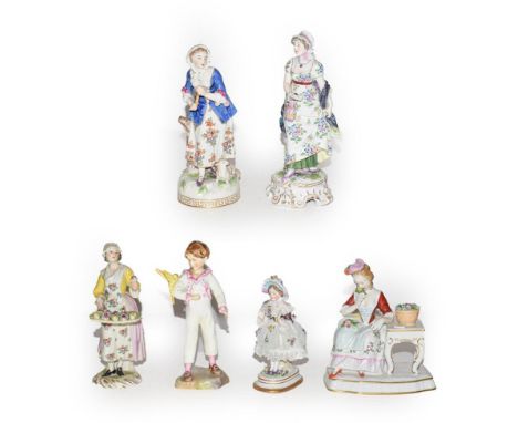 A Meissen style porcelain figure of a flower seller, marked R1762 together with other Continental figures including a Royal W