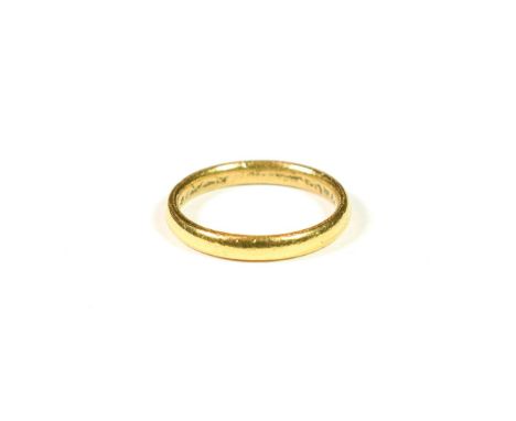 A 22 carat gold band ring, finger size M.  Gross weight 3.9 grams. 