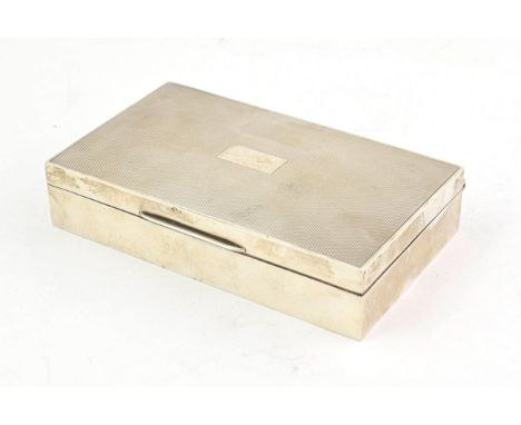 A George VI Silver Cigarette-Box, by Harman Brothers, Birmingham, 1951, oblong, the hinged cover with engine-turned decoratio