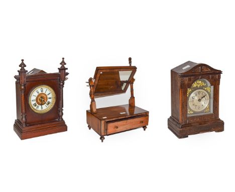 A mahogany cased Ansonia striking mantel clock, 38cm, an oak mantel timepiece and a 19th century mahogany single drawer dress
