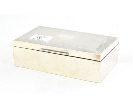 An Elizabeth II Silver Cigarette-Box, by Harman Brothers, Birmingham, 1953, oblong, the hinged cover with engine-turned decor
